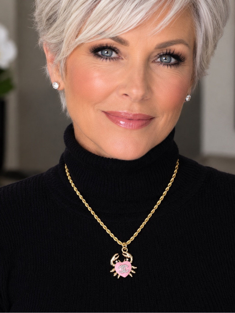 CHANEL Necklace with Pink
Heart CC Crab on new 18” titanium
Twisted rope chain